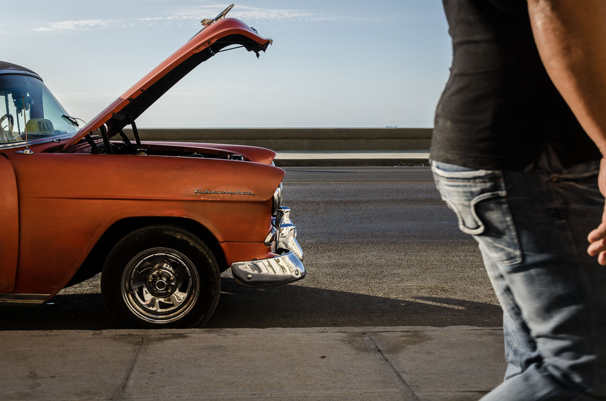 old american car in havana , street photography in cuba