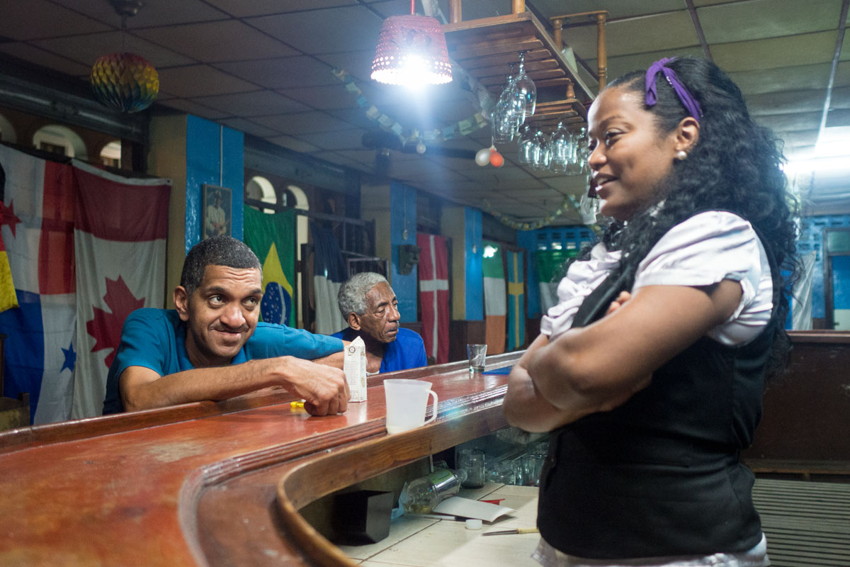 drunk cuban people in a bar , session of street photography