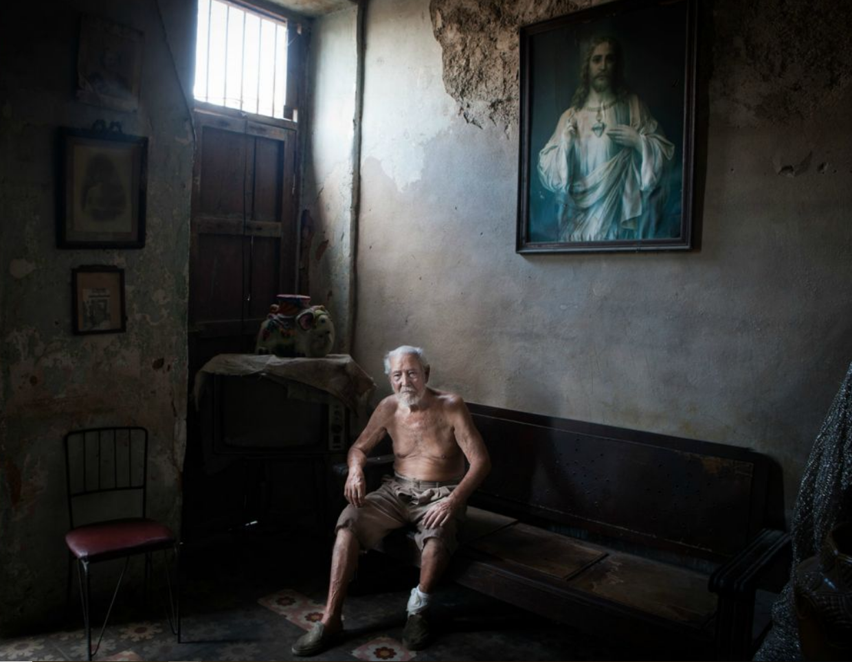 old man in an old cuban house a cuban picture by David Creedon