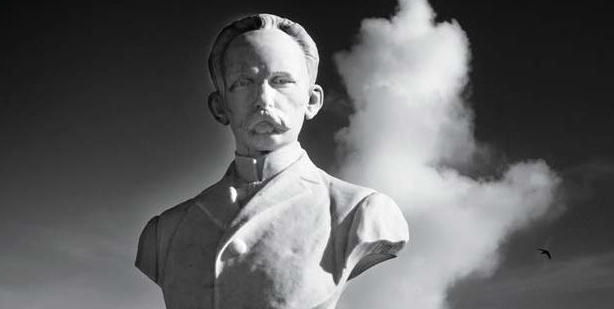 statue of jose marti with a cloud behind him by cuban photographer alfredo sarabia