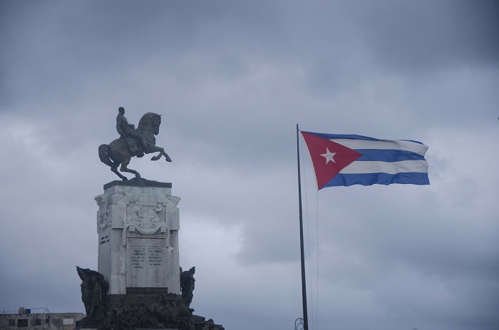 Maceo statue with cuban flag in havana, a urban landscape picture