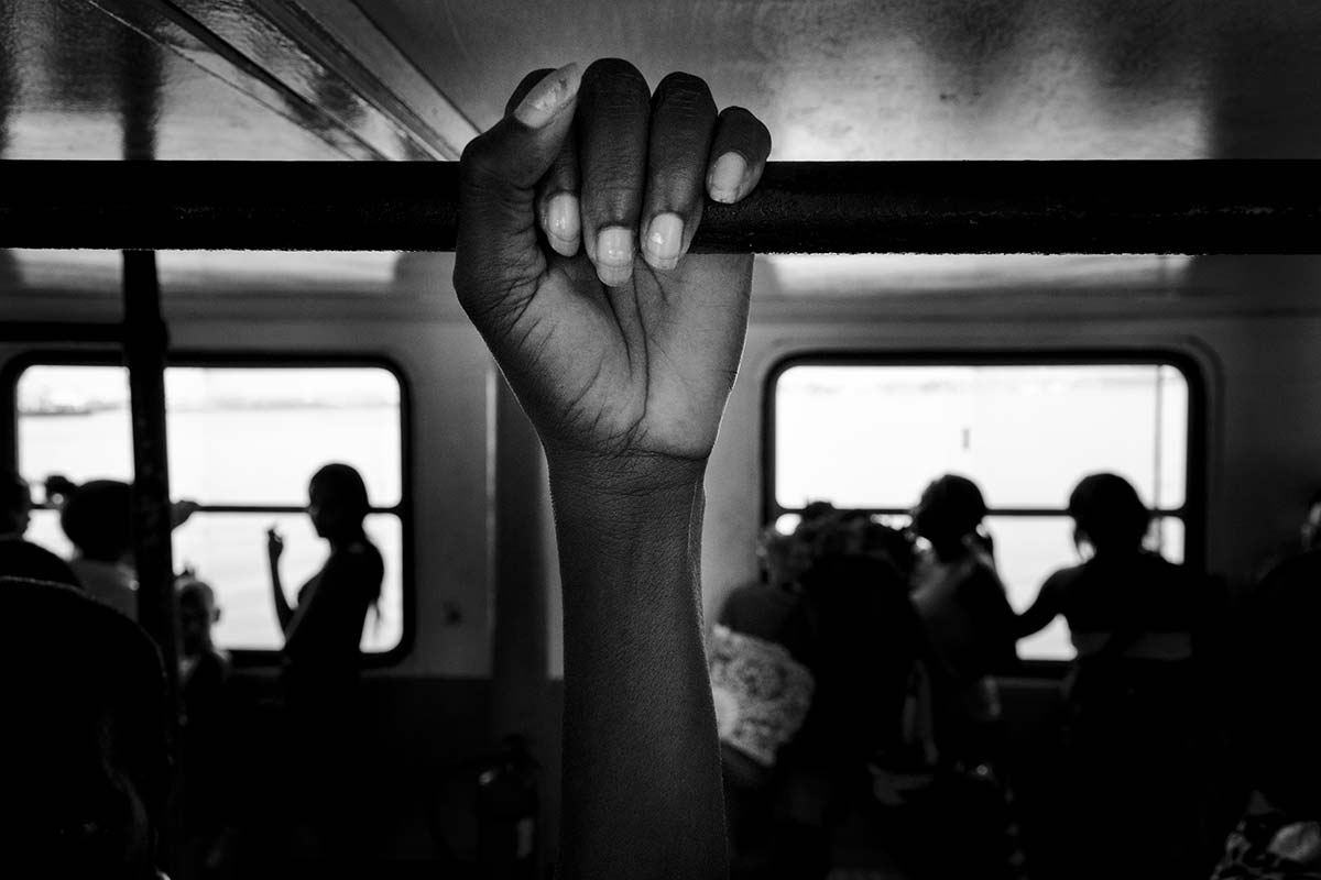 hand of a cuban woman in a ferry to go to Regla harbour